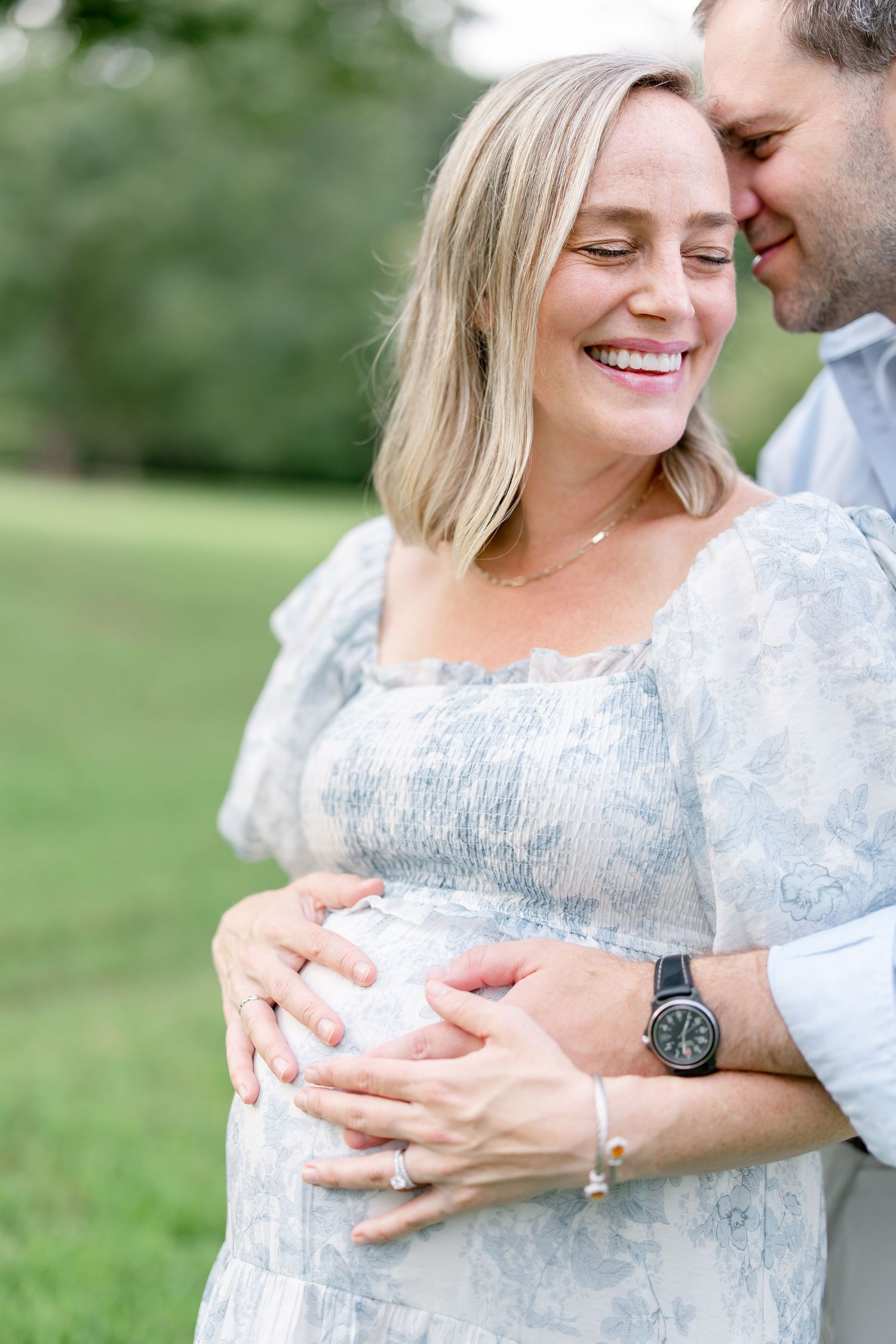 Close-up shots show couple embracing and smiling while wearing coordinated outfits outdoors.