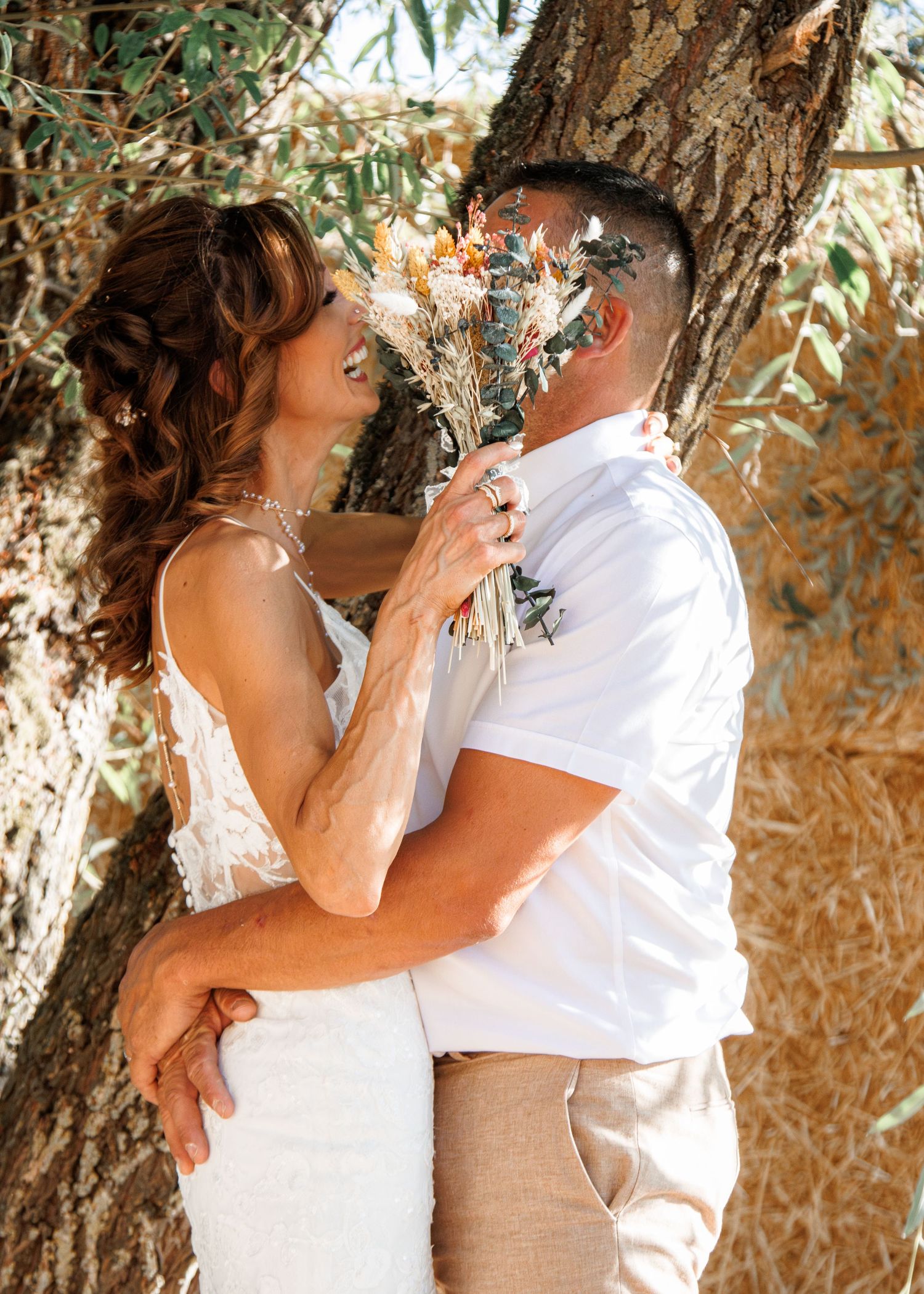Sequence of romantic sepia-toned photos showing couple embracing under a tree with soft natural lighting.