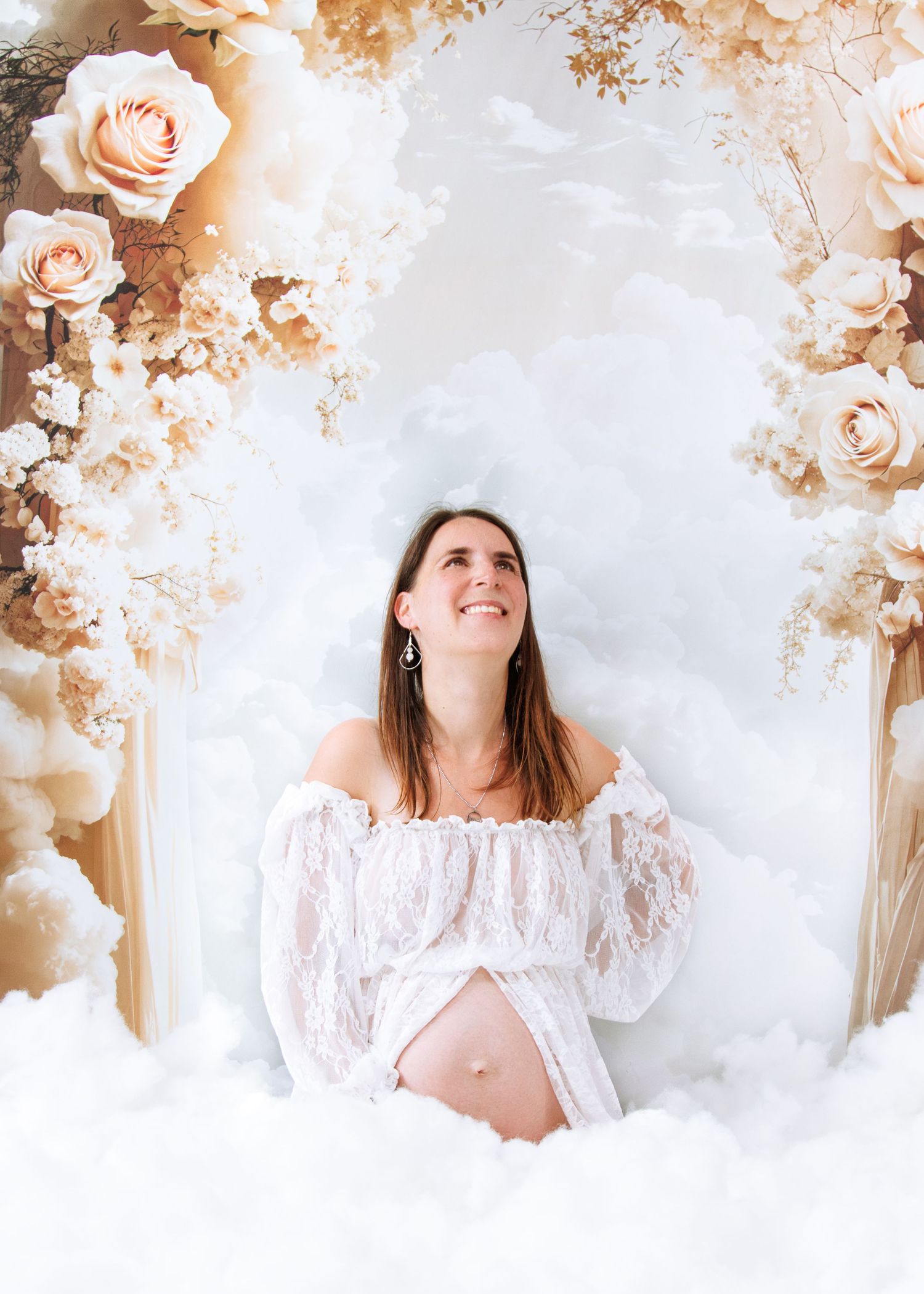 Ethereal floral scene with soft pink roses and delicate white decor creating a romantic dreamlike atmosphere.