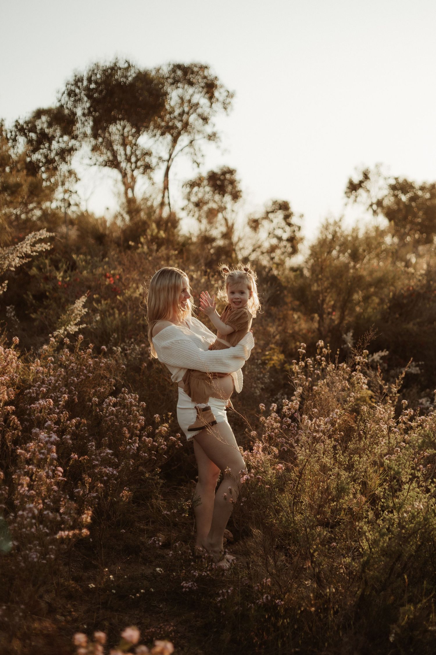 Perth Maternity Photographer, perth motherhood image, pregnancy belly, wildflowers, perth hills