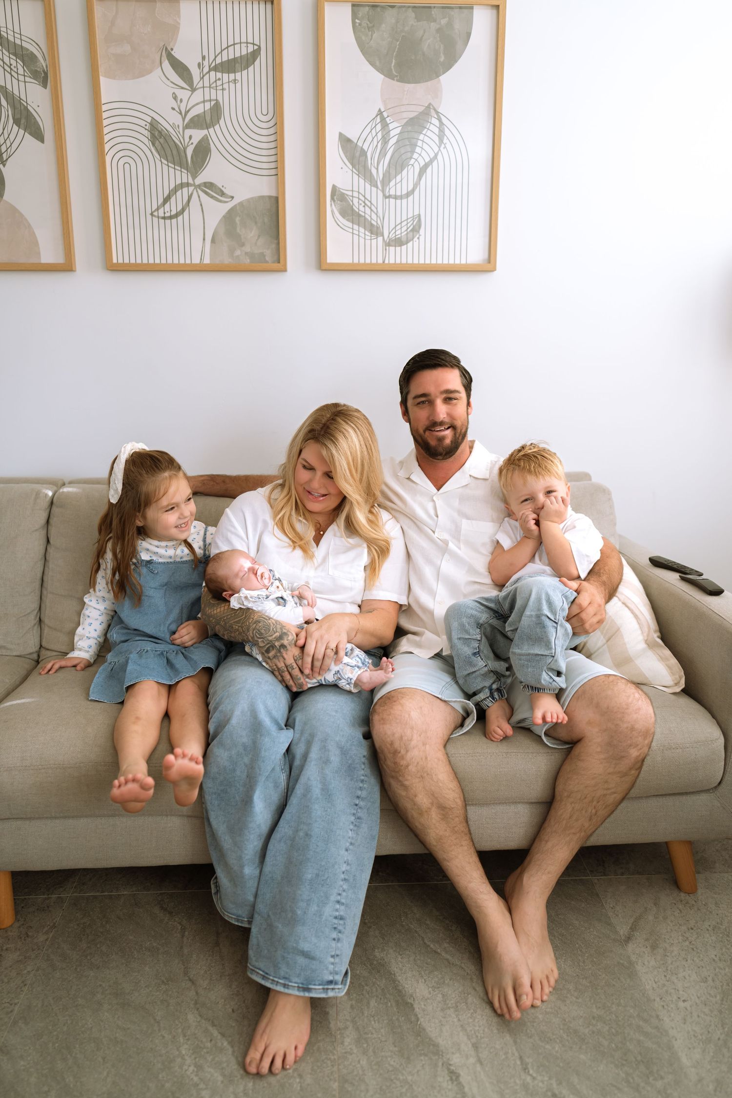 Perth Family Photographer, in home documentary style photoshoot, family and new baby, mum and dad film style image