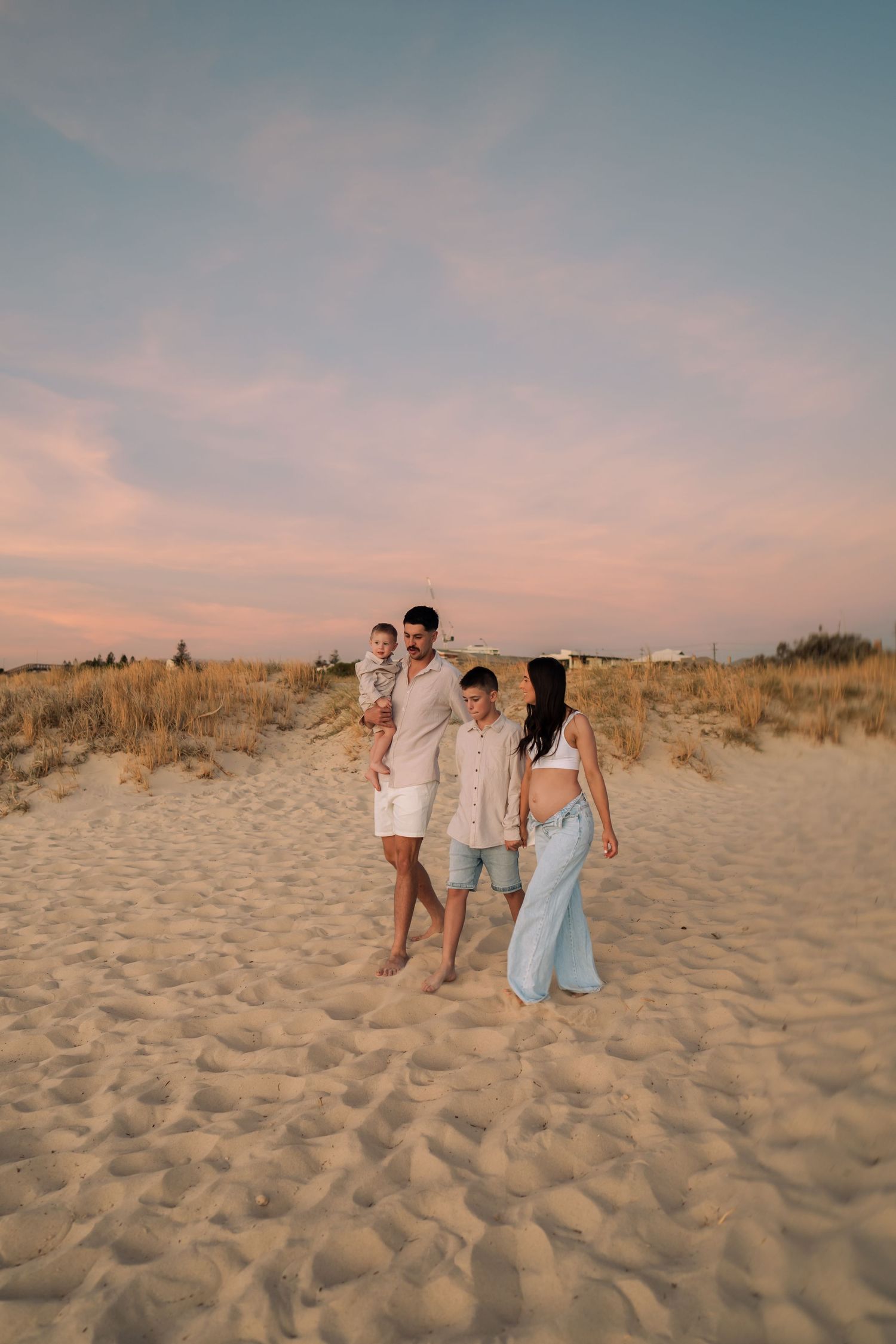 Perth Maternity Photographer Perth Family Photographer, happy beach perth photoshoot mum and dad and two toddler girls candid