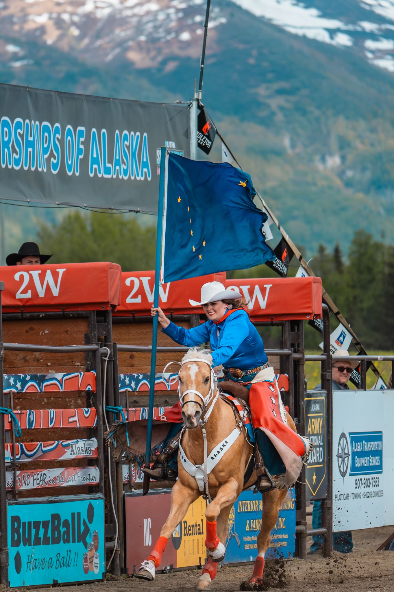 Rodeo Photographer captures Rodeo Alaska in Palmer, Image by North and Wild Alaska Flag and Flag girl