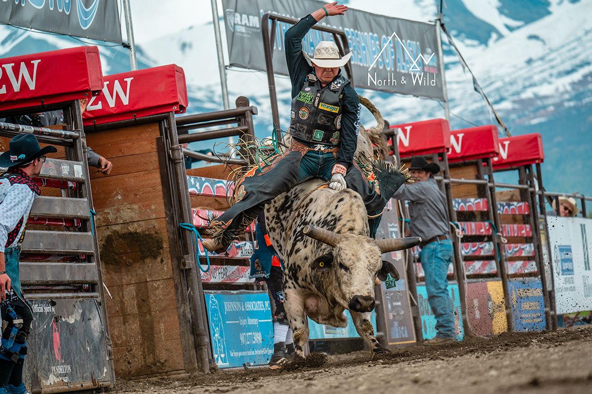 Rodeo Photographer captures Rodeo Alaska in Palmer, Image by North and Wild Bull Rider Mountains