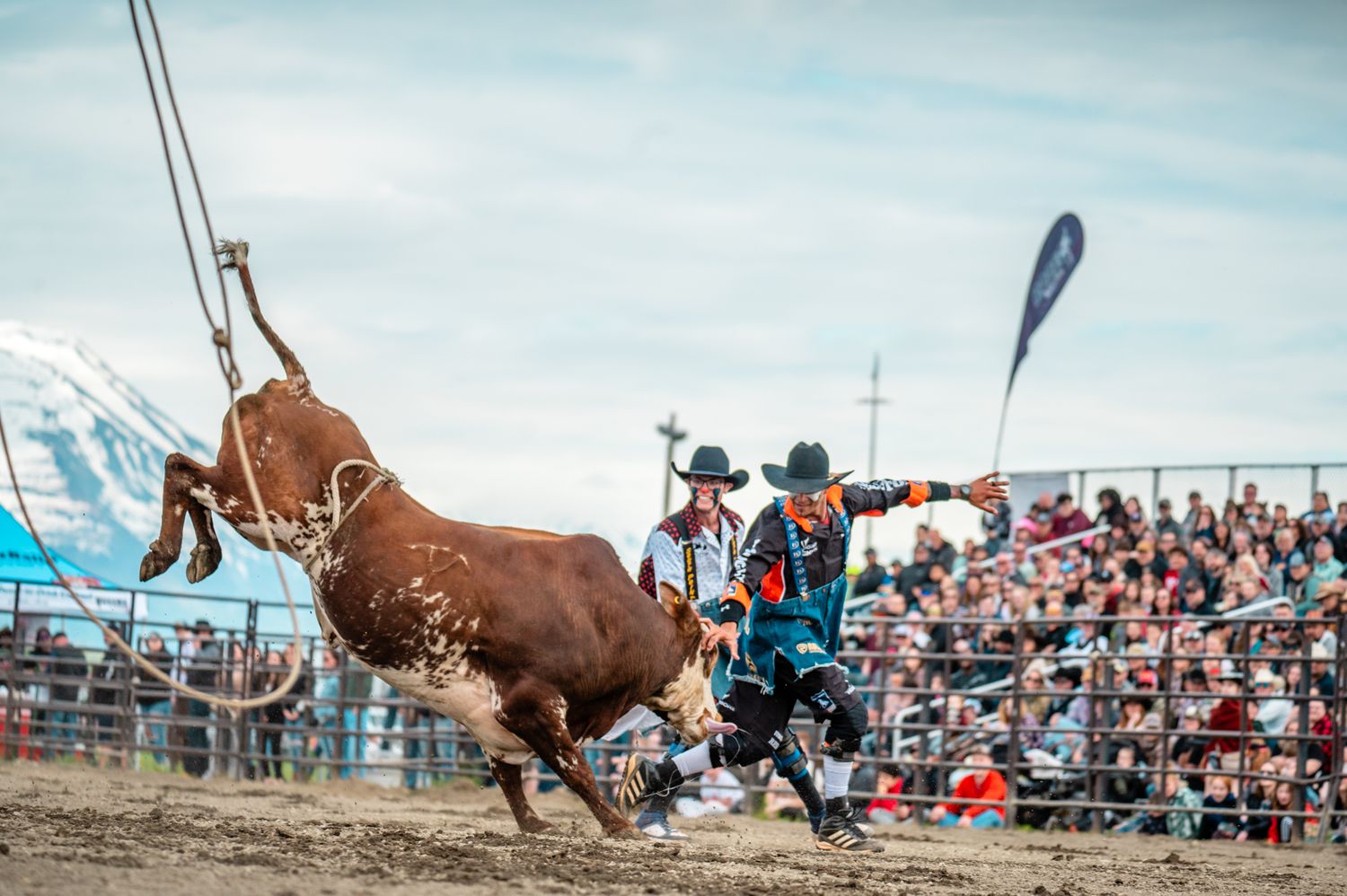 Rodeo Photographer captures Rodeo Alaska in Palmer, Image by North and Wild Bull Rider and Bull Fighter