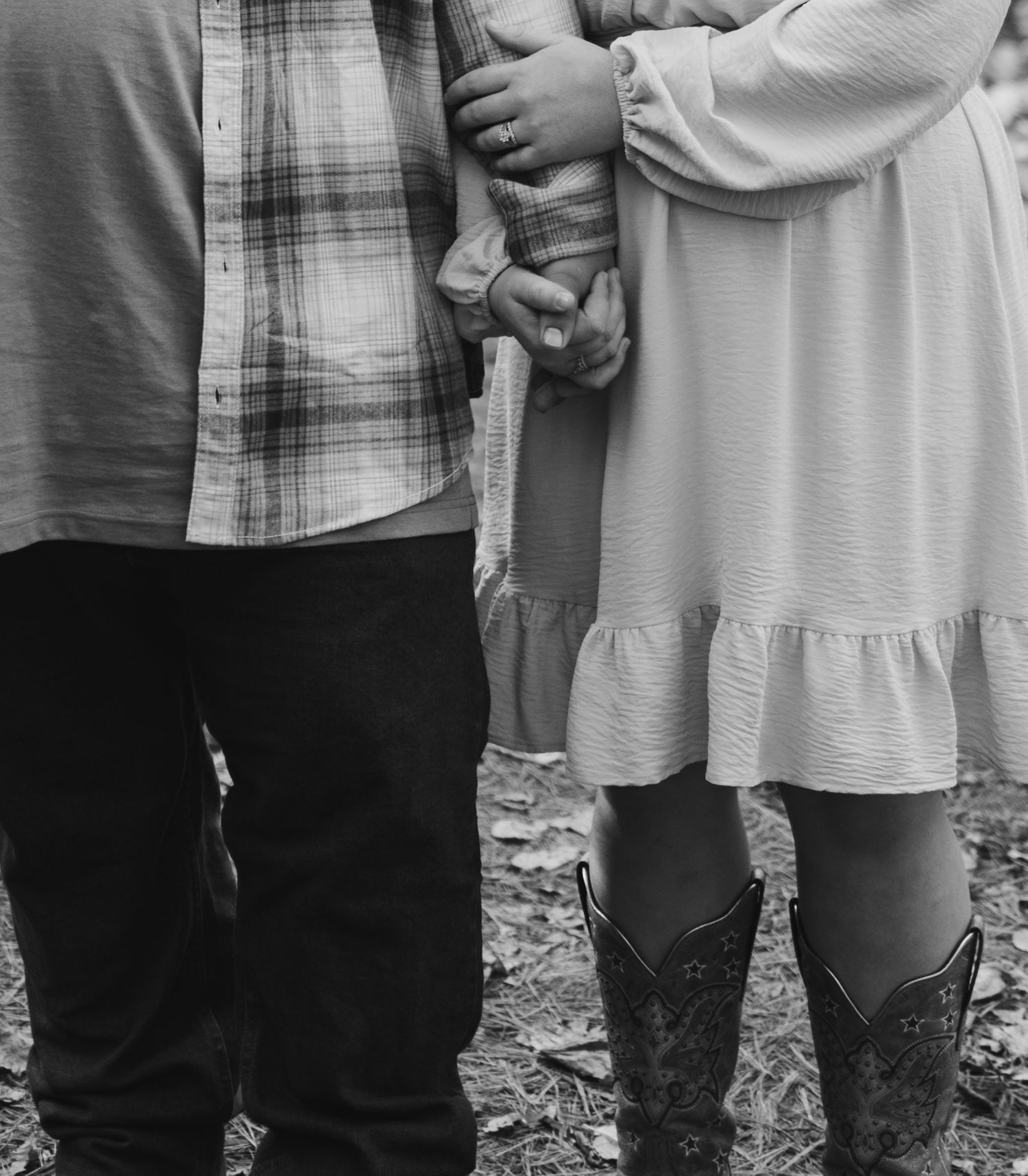 A series of intimate black and white portraits showing a couple's tender embrace.