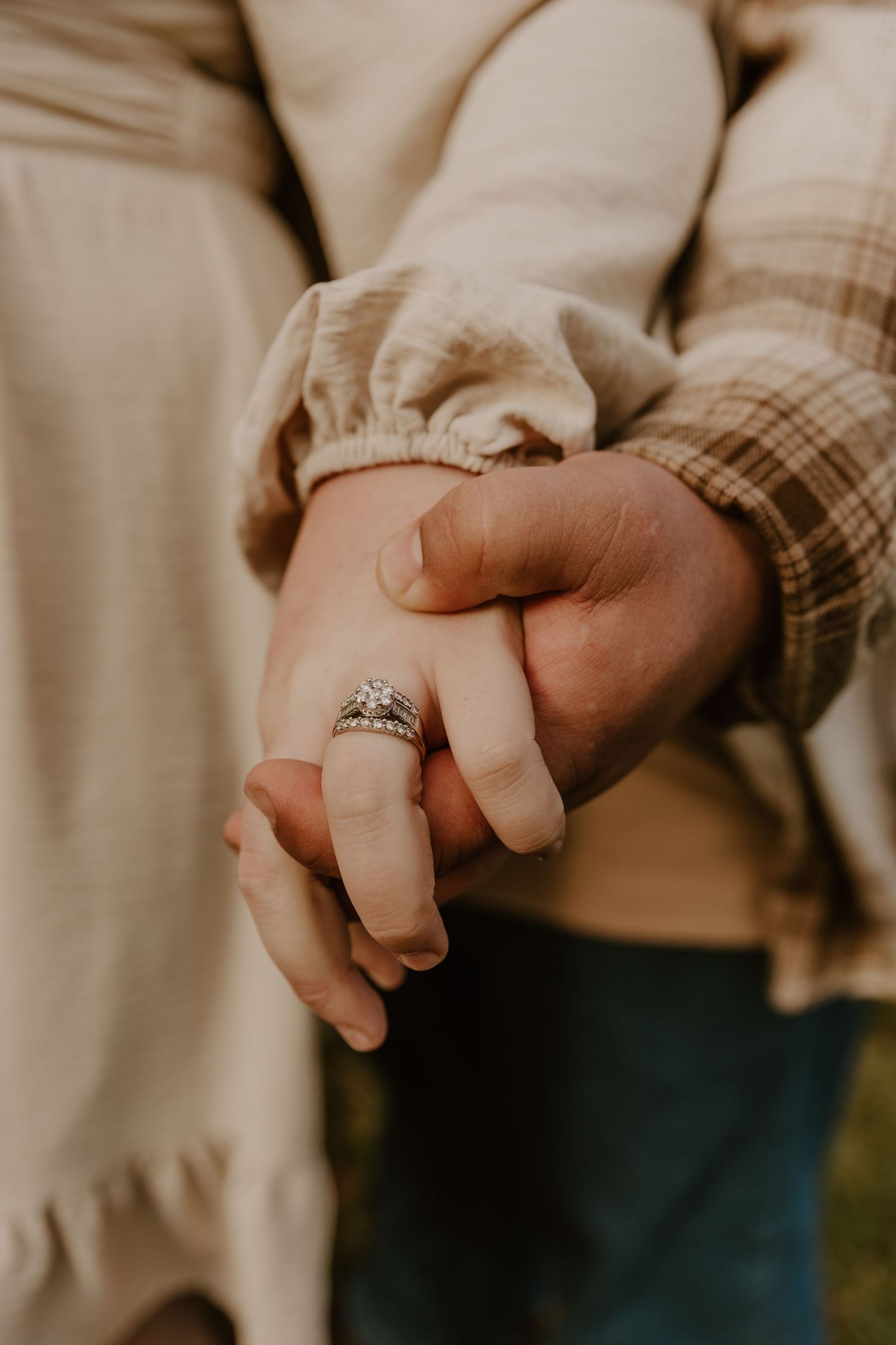 Close-up shots of hands clasped together, showing an engagement ring in warm sepia tones.