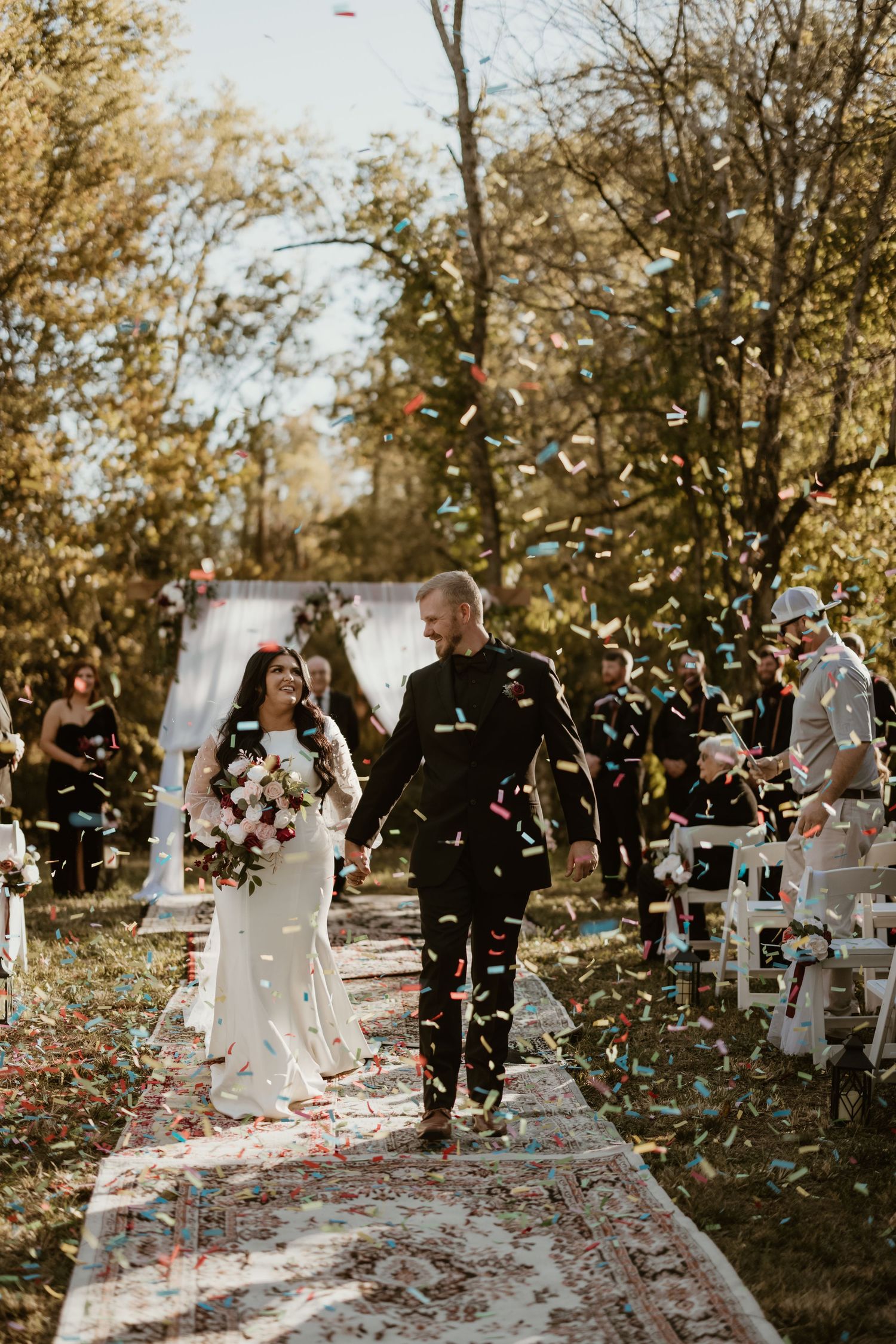 A wedding ceremony captured in a series of photos showing celebratory confetti being tossed in an outdoor autumn setting.