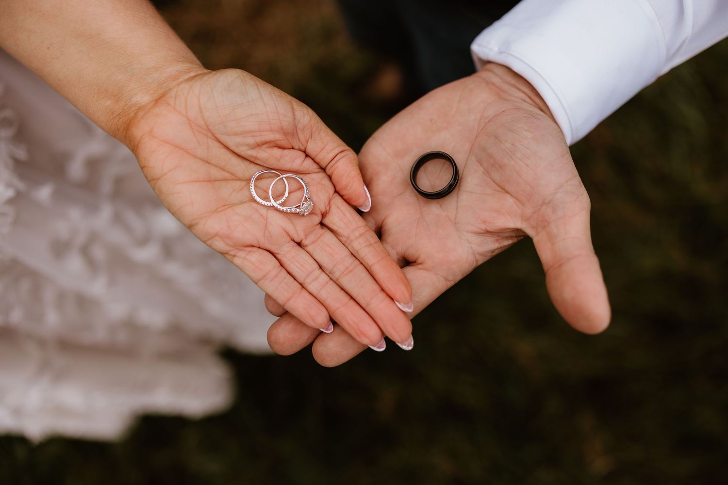 Close up sequence of wedding ring exchange showing hands during marriage ceremony.