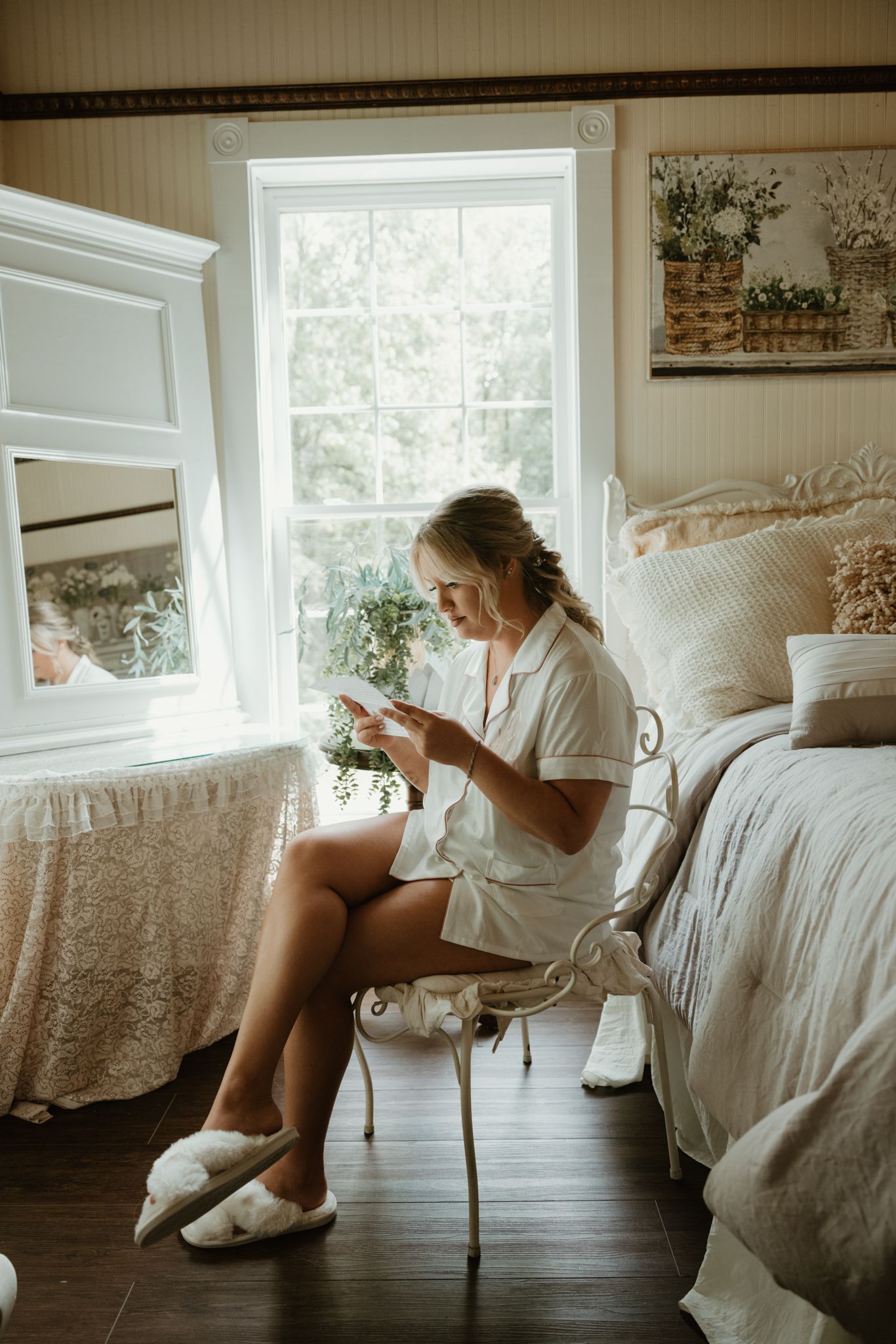 Morning preparation scene with bridal robes and slippers in a cozy bedroom setting.