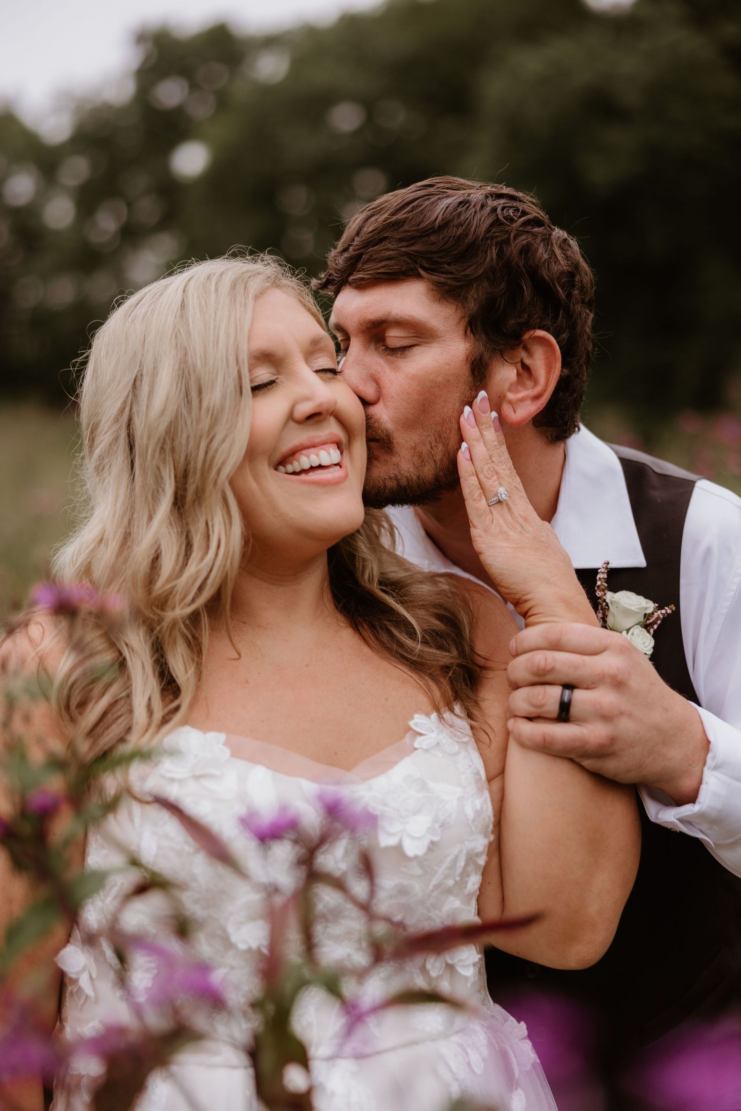 A couple shares romantic moments among purple flowers in a series of tender wedding photography poses at sunset.