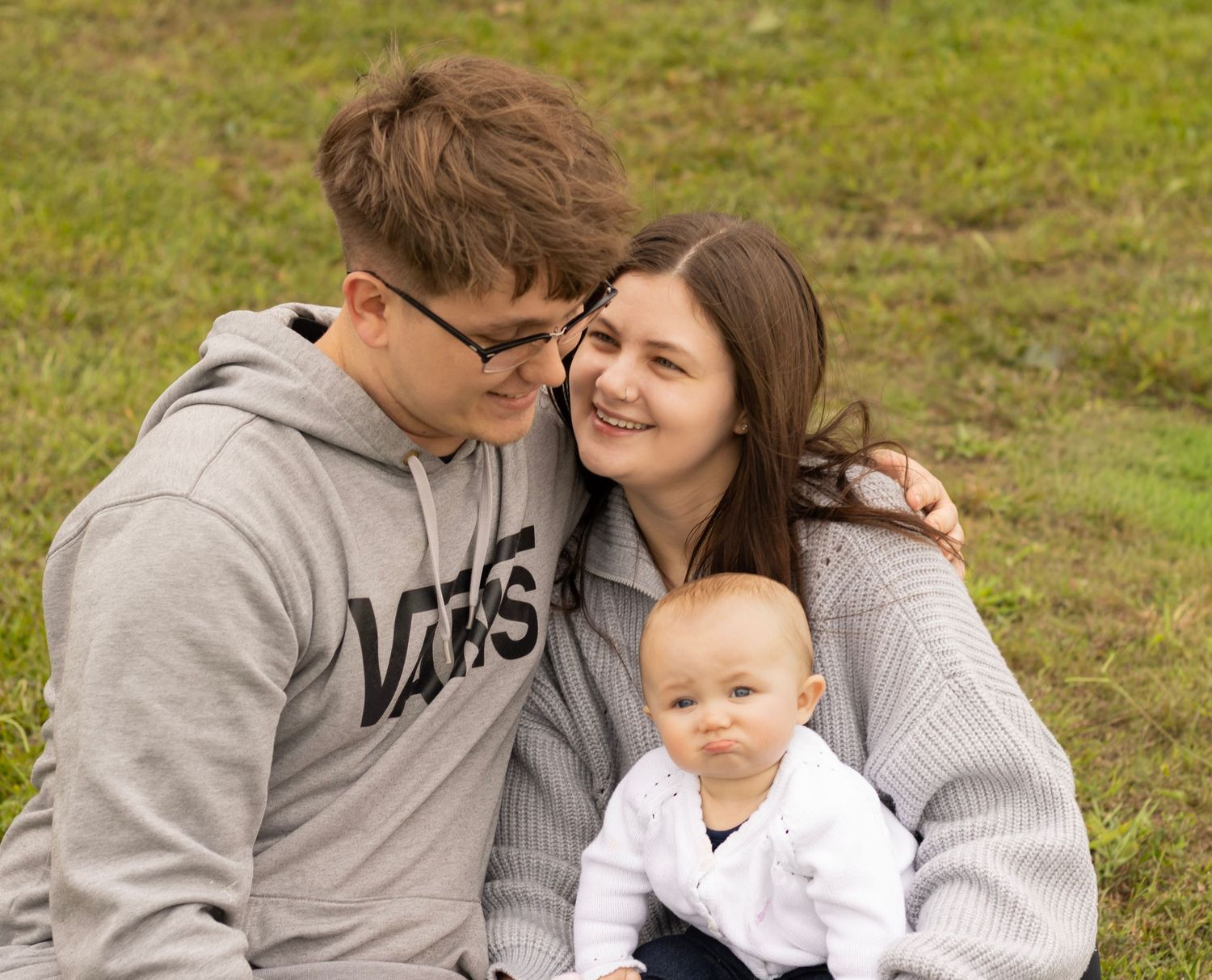 A family picture in the grass