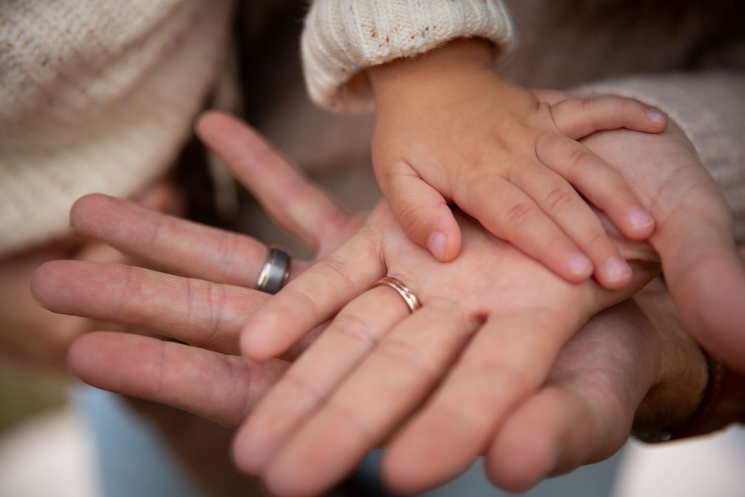 Close-up view of hands touching and holding each other showing connection and unity-Northwest Georgia Jessica M Cooper Photography LLC