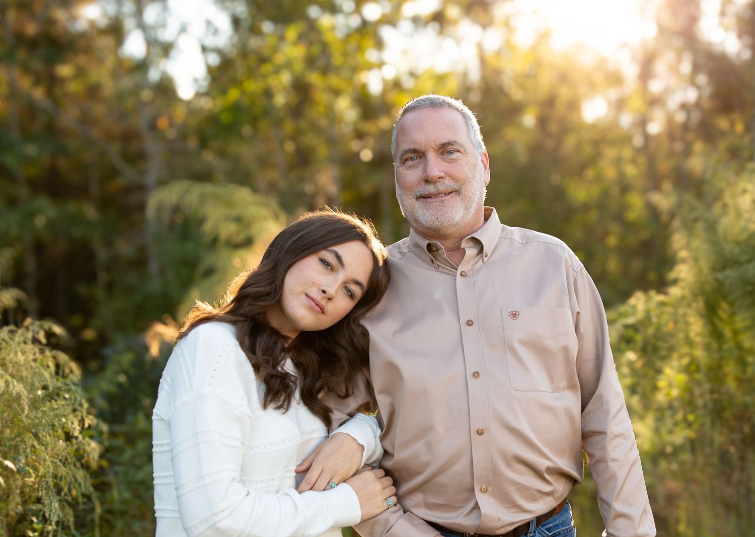 Father and daughter share affectionate poses during a golden hour photo session-Northwest Georgia Jessica M Cooper Photography LLC