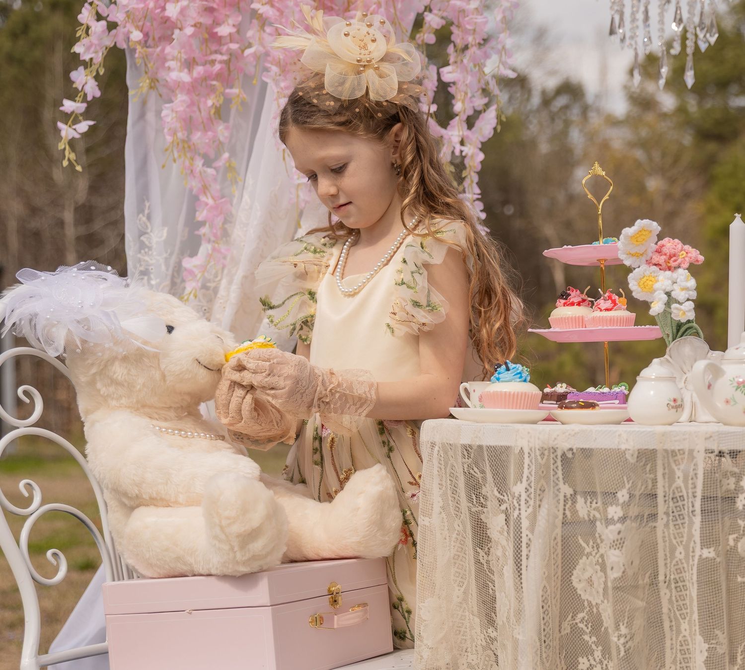 A dreamy outdoor tea party scene with pink blossoms, vintage decor,  Rome, GA Jessica M Cooper Photography LLC