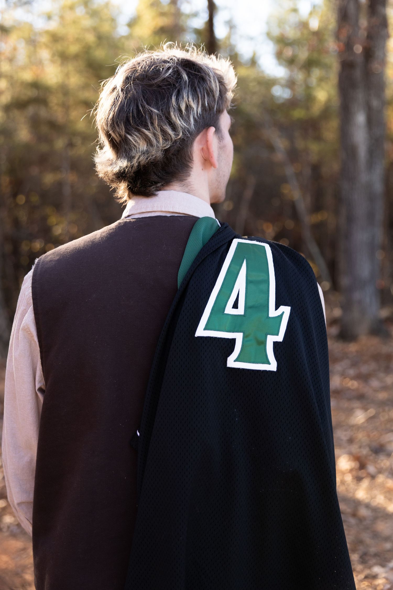 A person wearing a dark vest with the number 4 jersey over shoulder-Northwest Georgia Jessica M Cooper Photography LLC