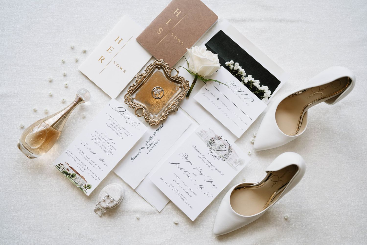 Wedding stationery flat lay with elegant invitations and bridal shoes in neutral tones.