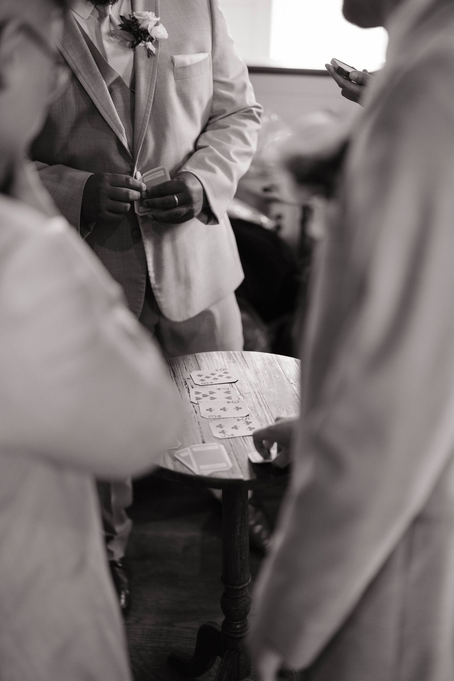 A close-up detail shot of a guest book being signed at an elegant wedding.