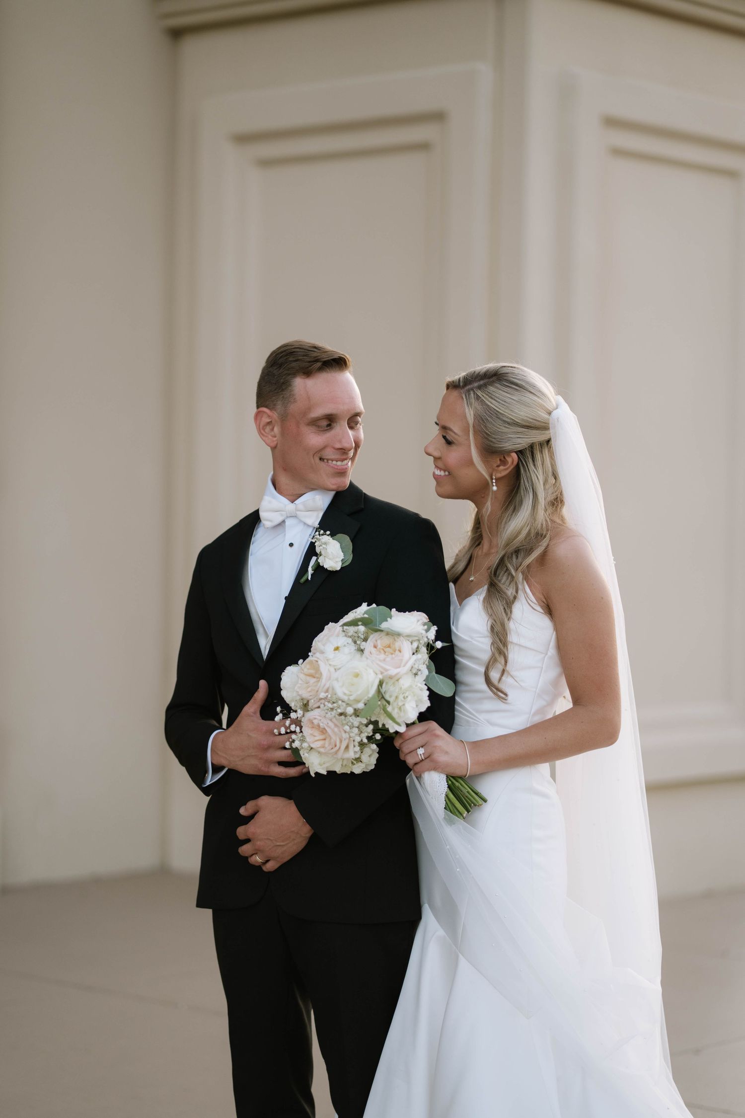 A couple shares intimate moments together during their wedding photo session.