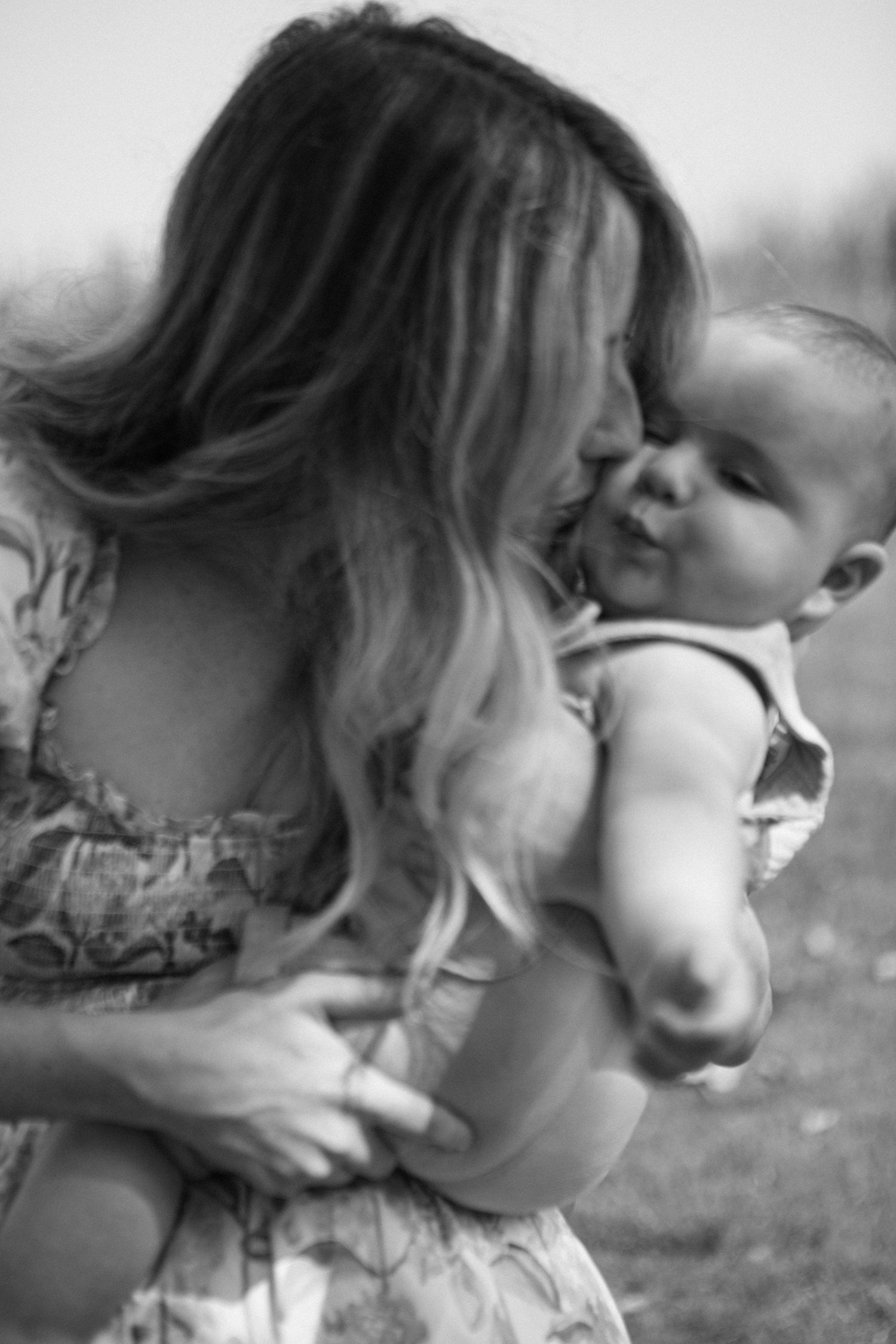 Black and white intimate portrait series showing tender emotional moments.