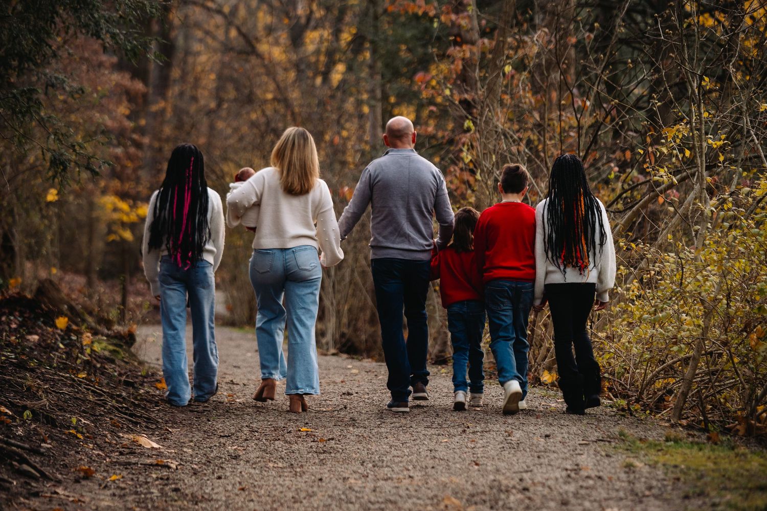 Family walking to the car after a shoot