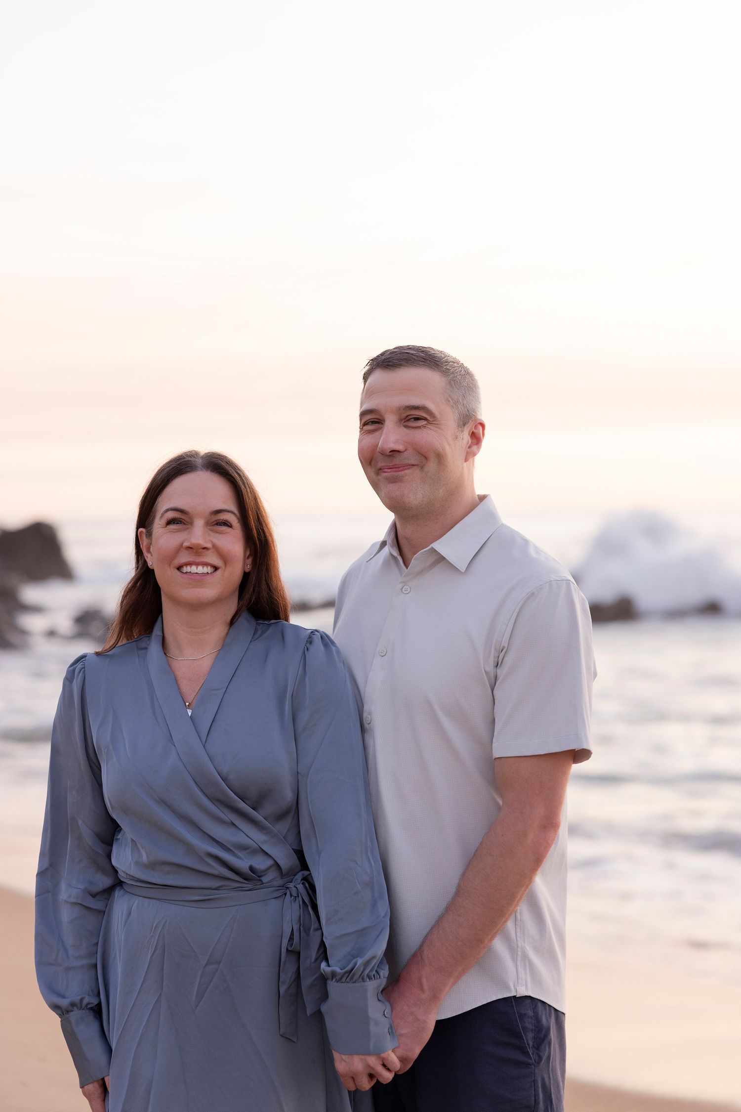 Sayulita family portrait photographer capturing parents together during a relaxed sunset beach photography session.