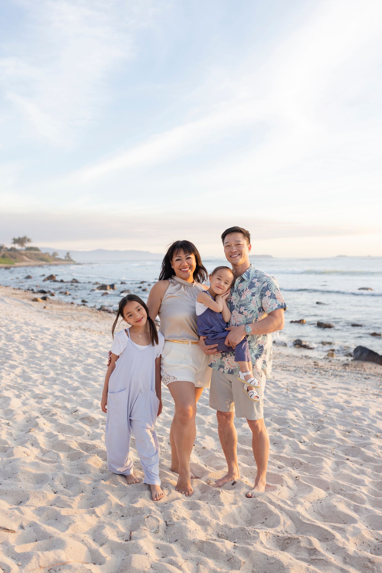 Family vacation photography at The St. Regis Punta Mita, Mexico, capturing beautiful beach portraits at sunset.
