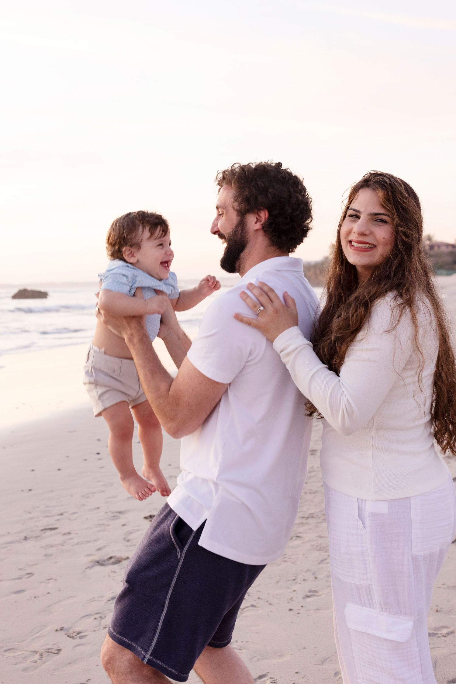Family photography at Susurros del Corazón, Punta Mita, capturing candid beach vacation moments and beautiful portraits with your children.