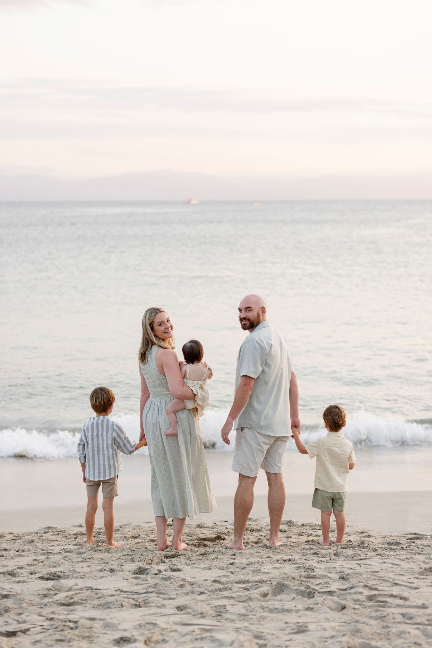 Book a family beach photo session in La Cruz, Mexico, for natural vacation portraits and meaningful moments together by the ocean.