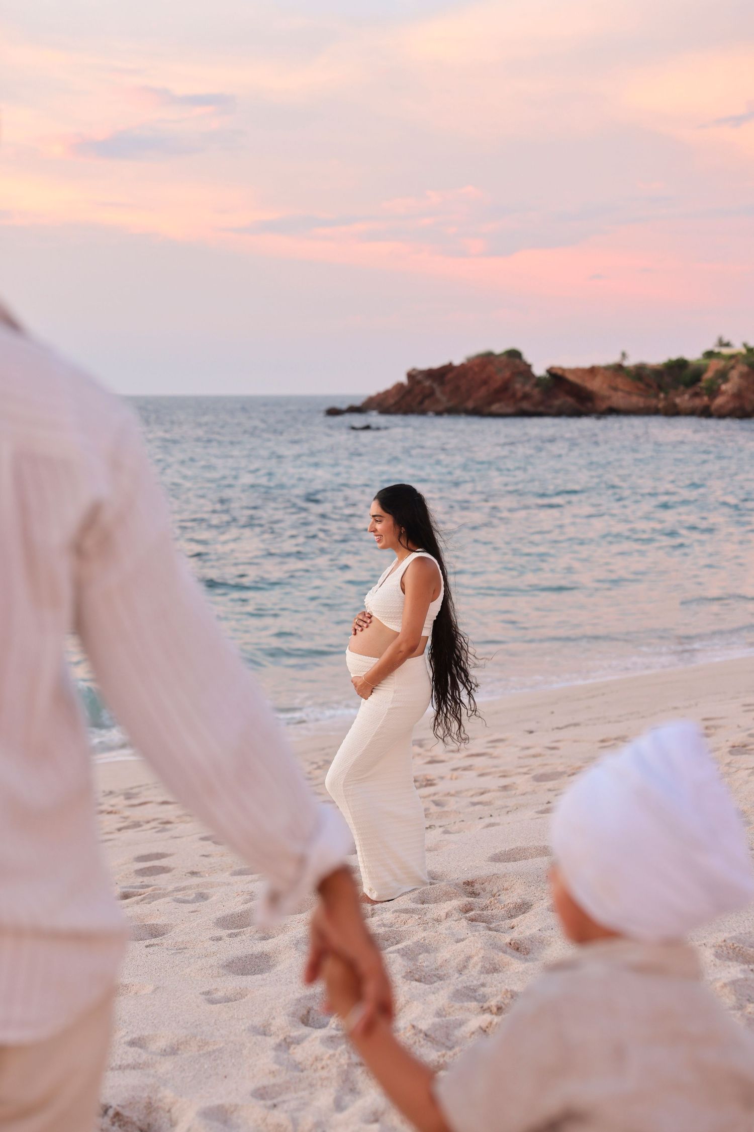 Family and maternity photography at Four Seasons Punta Mita, Mexico, capturing beach portraits at sunset.