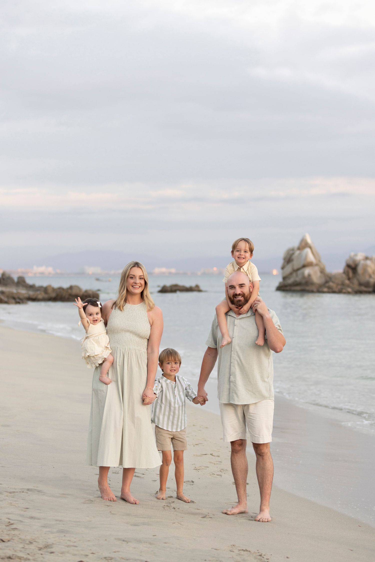 Book a family beach photo session in La Cruz, Mexico, for natural vacation portraits and meaningful moments together by the ocean.