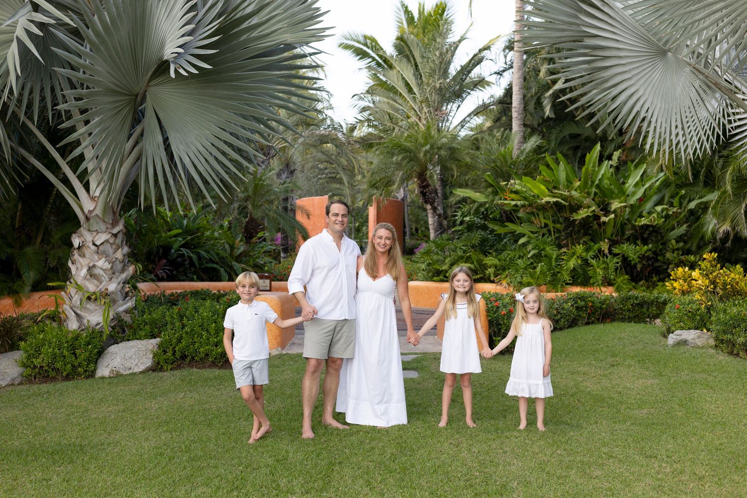 Family vacation photography in La Cruz de Huanacaxtle, Mexico, with relaxed family portraits in a tropical garden setting.