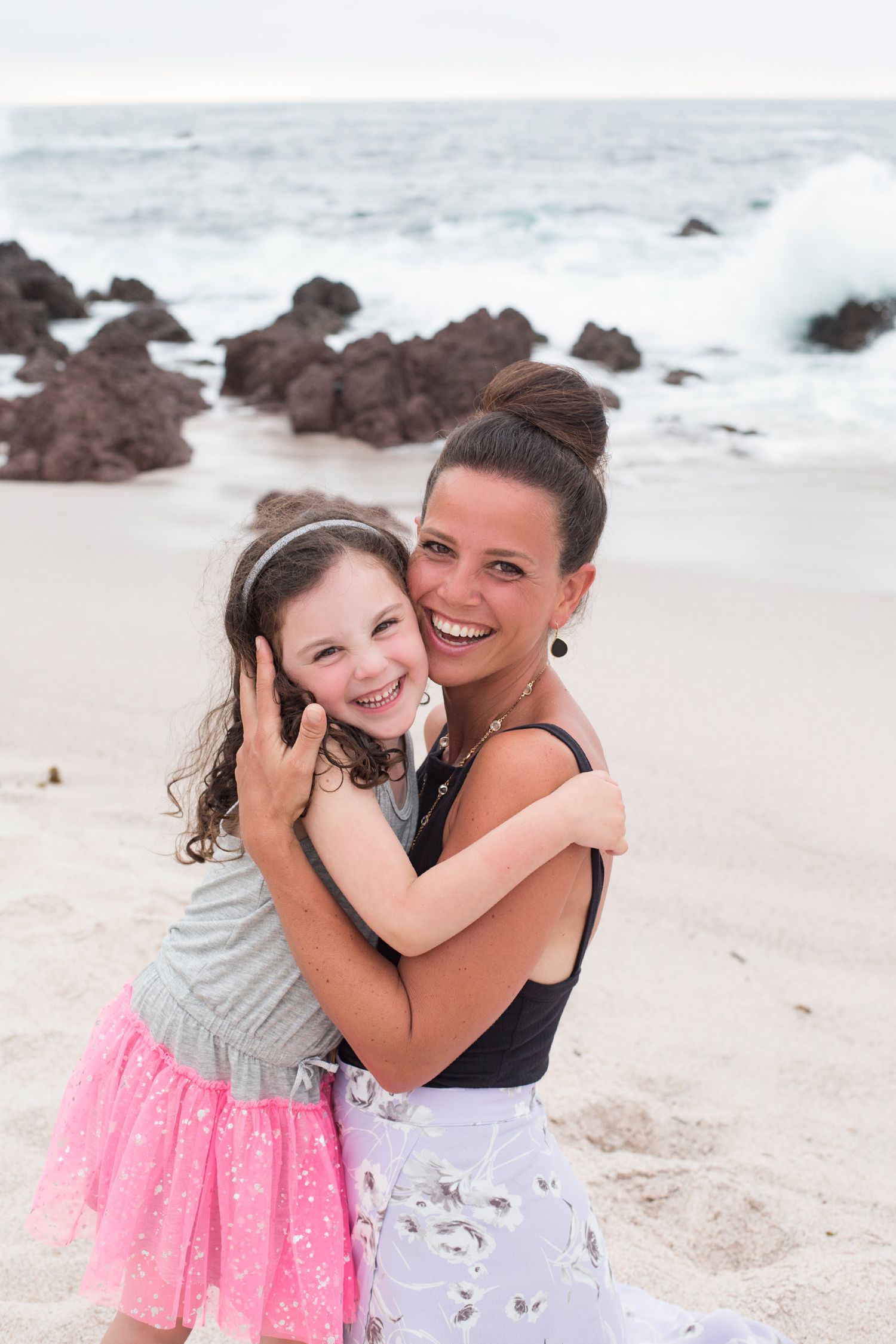Family vacation photography at The St. Regis Punta Mita, Mexico, capturing beautiful beach portraits at sunset.