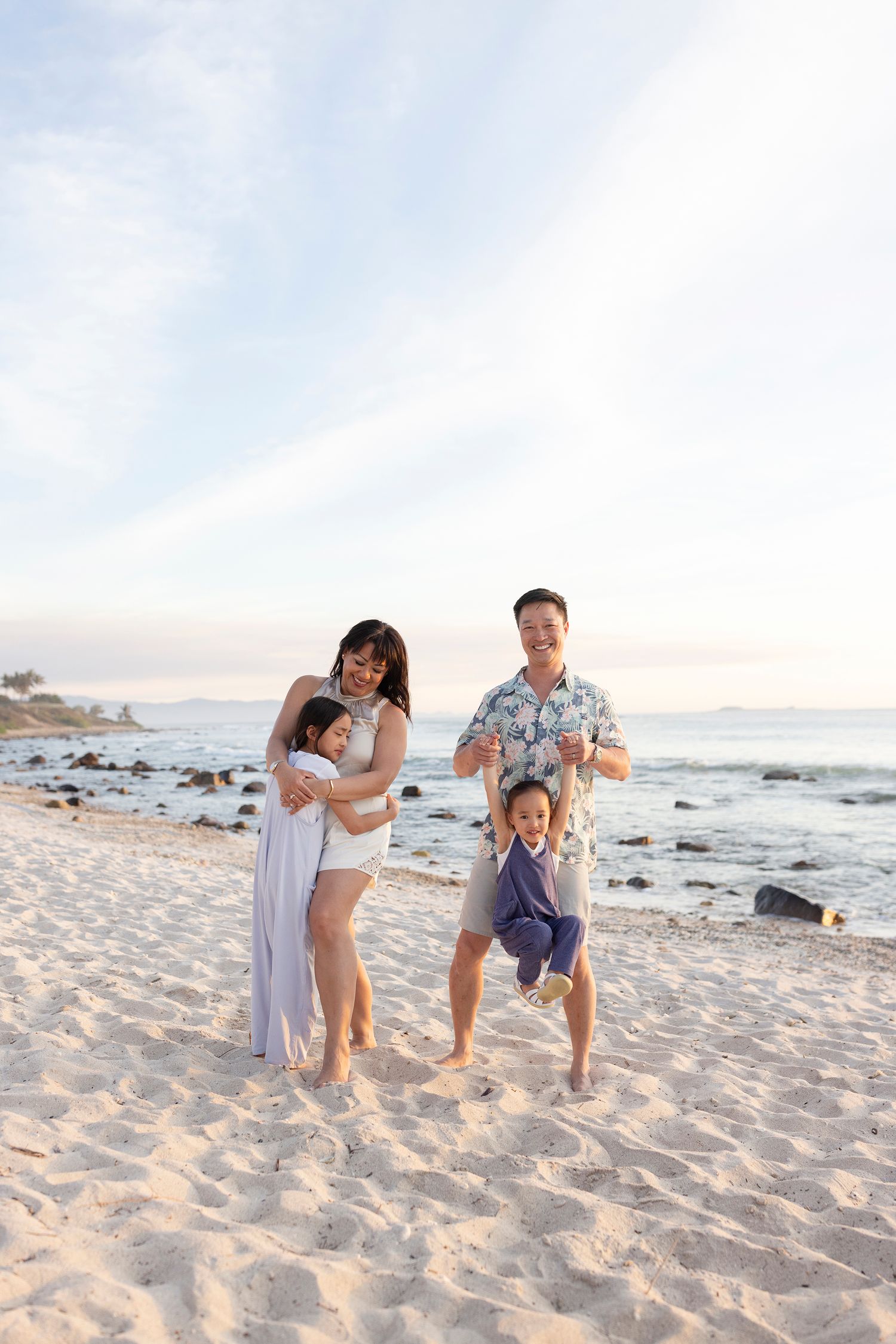 Family vacation photography at The St. Regis Punta Mita, Mexico, capturing beautiful beach portraits at sunset.