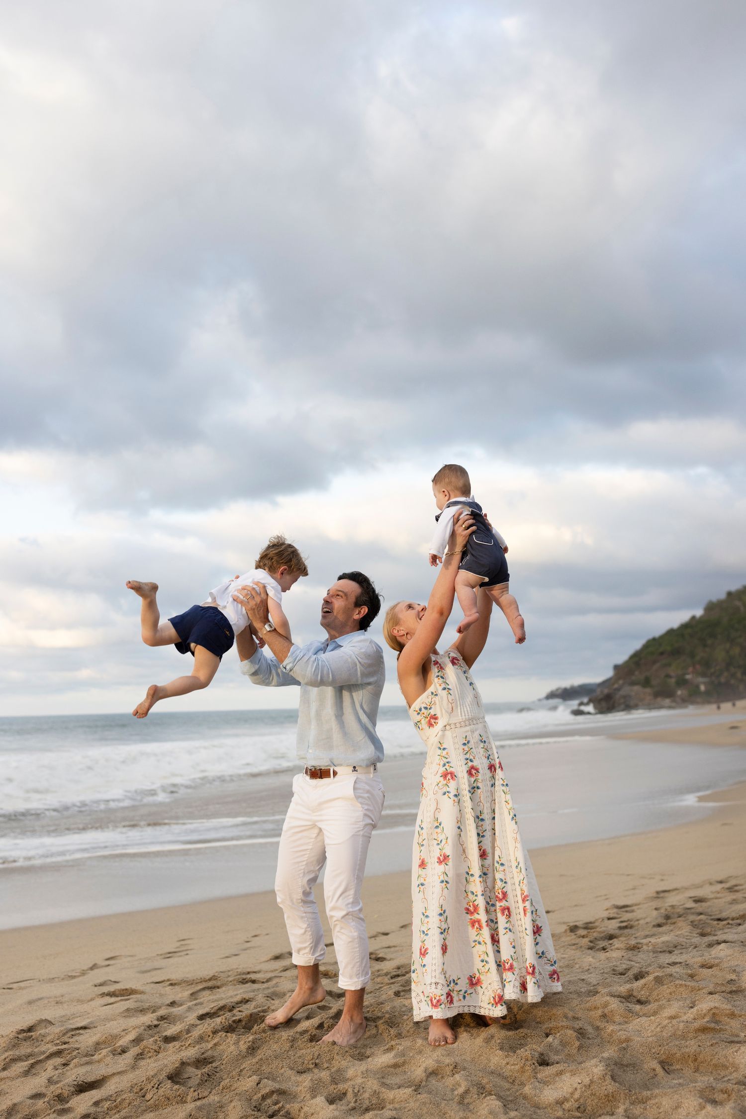 Family beach photography in Sayulita, Mexico, capturing playful moments and natural portraits during your vacation.