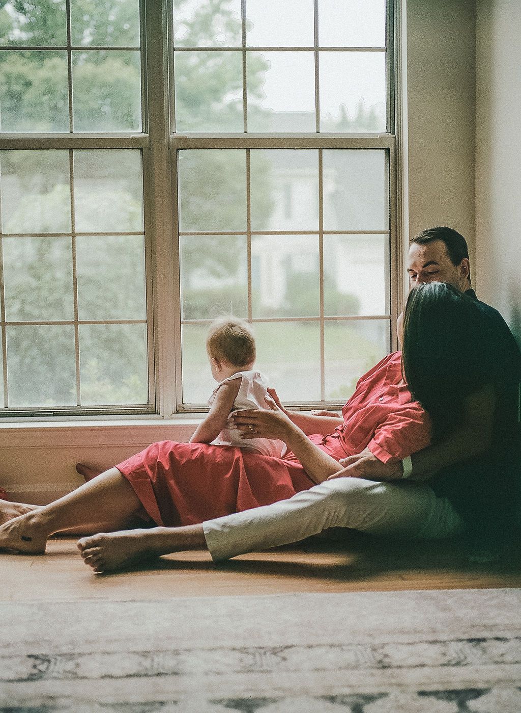 A sequence of artistic photos showing a person lying against a sunlit window in a dreamy atmosphere.
