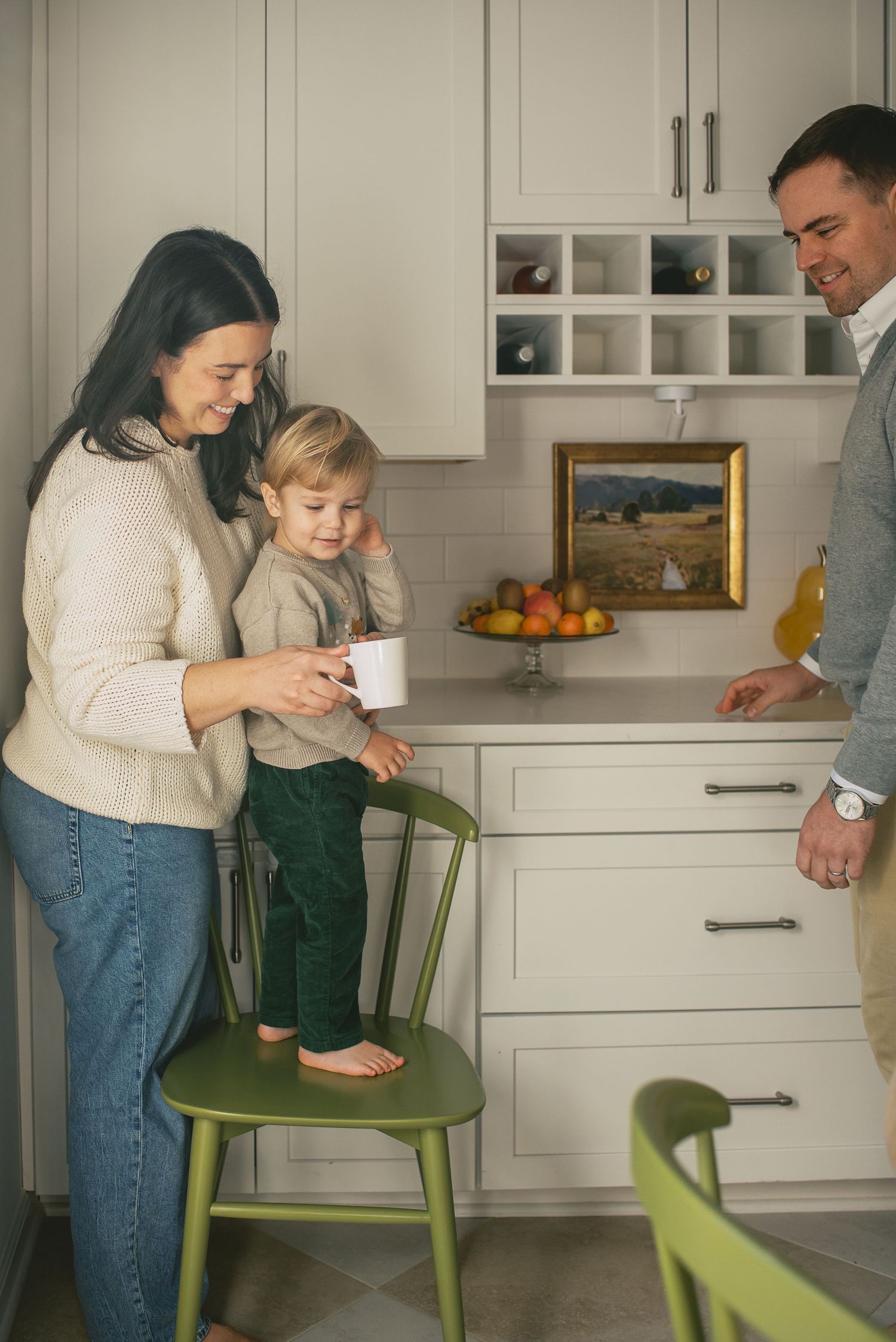 A sequence of photos showing a family gathering in a modern kitchen with lime green chairs and white cabinets.