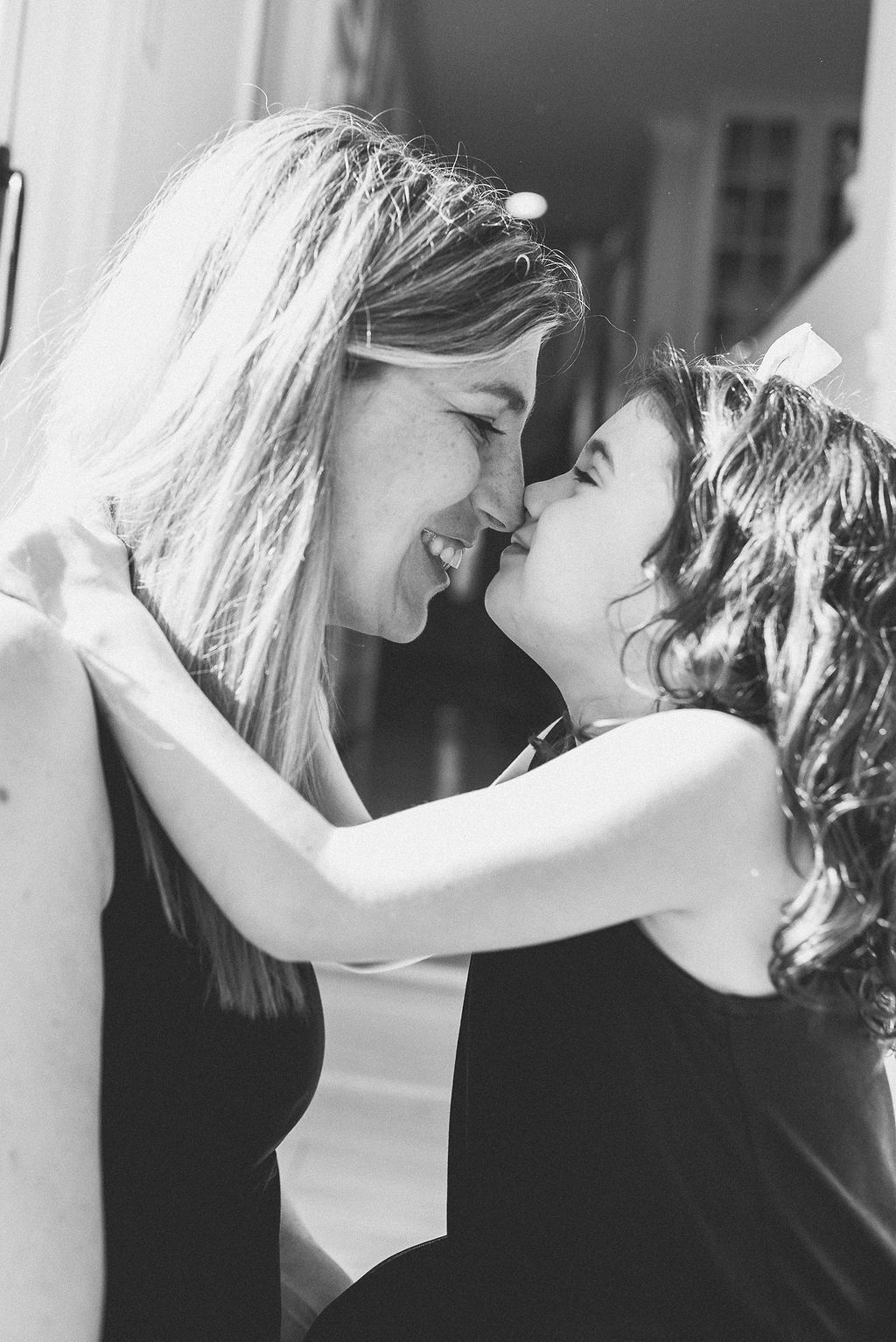 Black and white portraits capturing intimate moments of connection and joy.