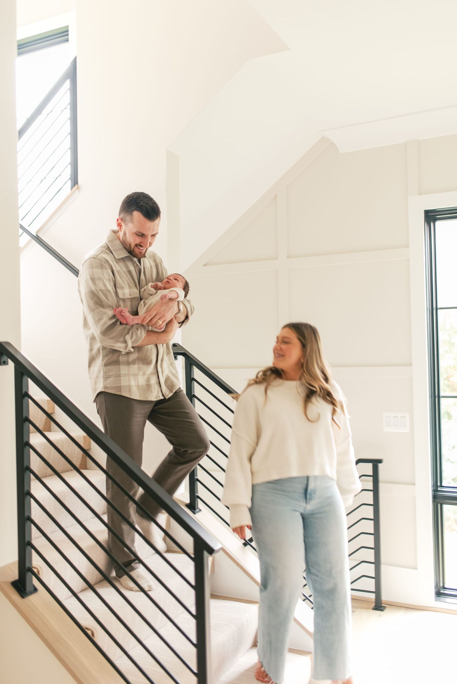 Four connected images show a romantic proposal moment on modern white stairs with black railings.