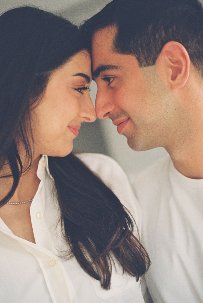 Close-up series of a romantic couple sharing intimate moments in white clothing against a light background.