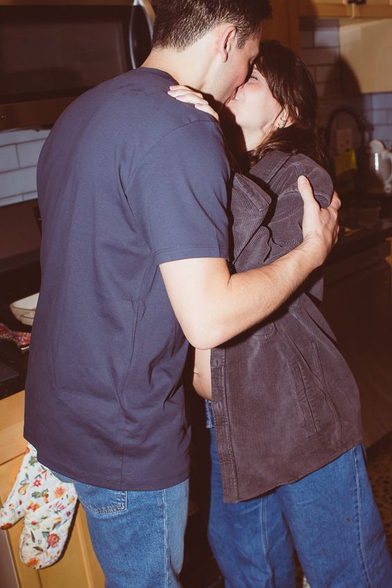 A series of candid indoor photos showing two people embracing in casual clothing against a dim background.