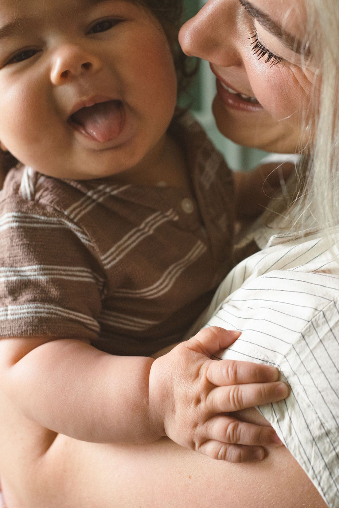A playful moment captures a joyful interaction between two people sharing laughter and affection.