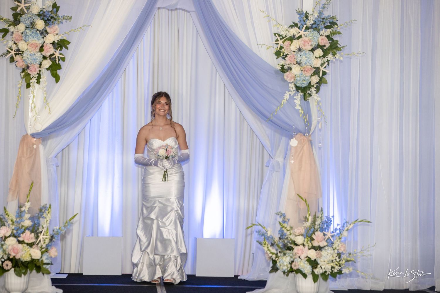 A collage of wedding ceremony photos showing white drapes, floral arrangements and elegant decor in a reception venue.