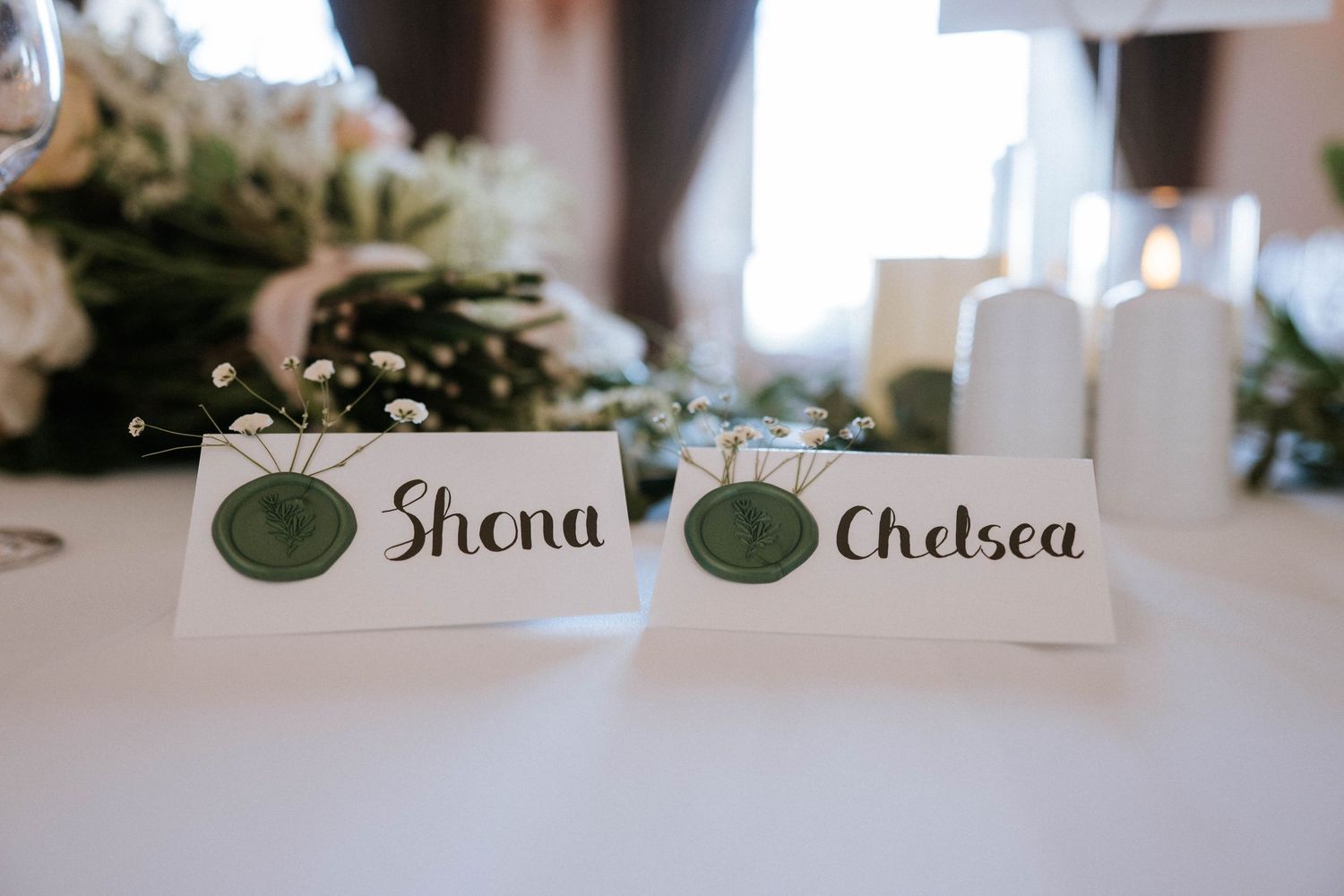 Place cards and table settings arranged for a formal dining event.