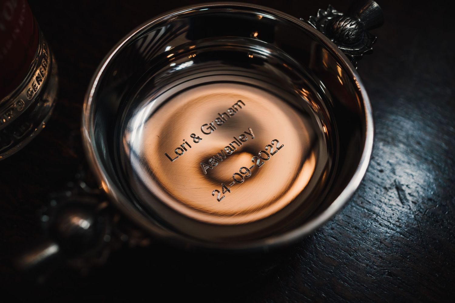 Close-up shots of engraved copper watch faces with dramatic lighting and reflective surfaces.