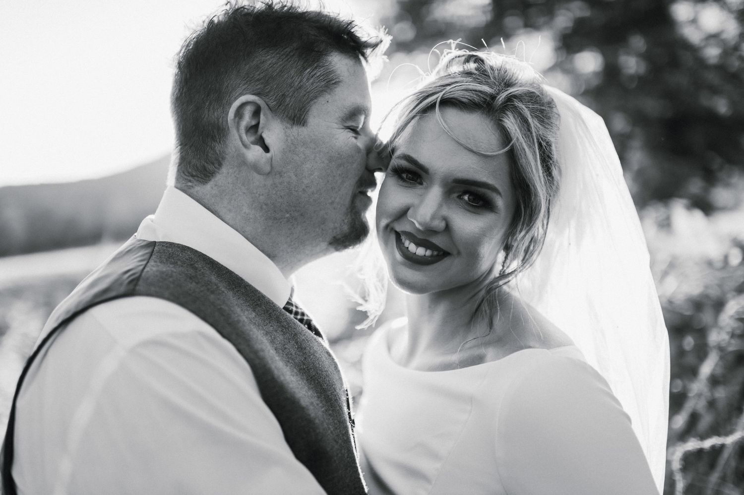 Aberdeen Wedding Photography. Black and white close-up captures intimate wedding moments between a couple.