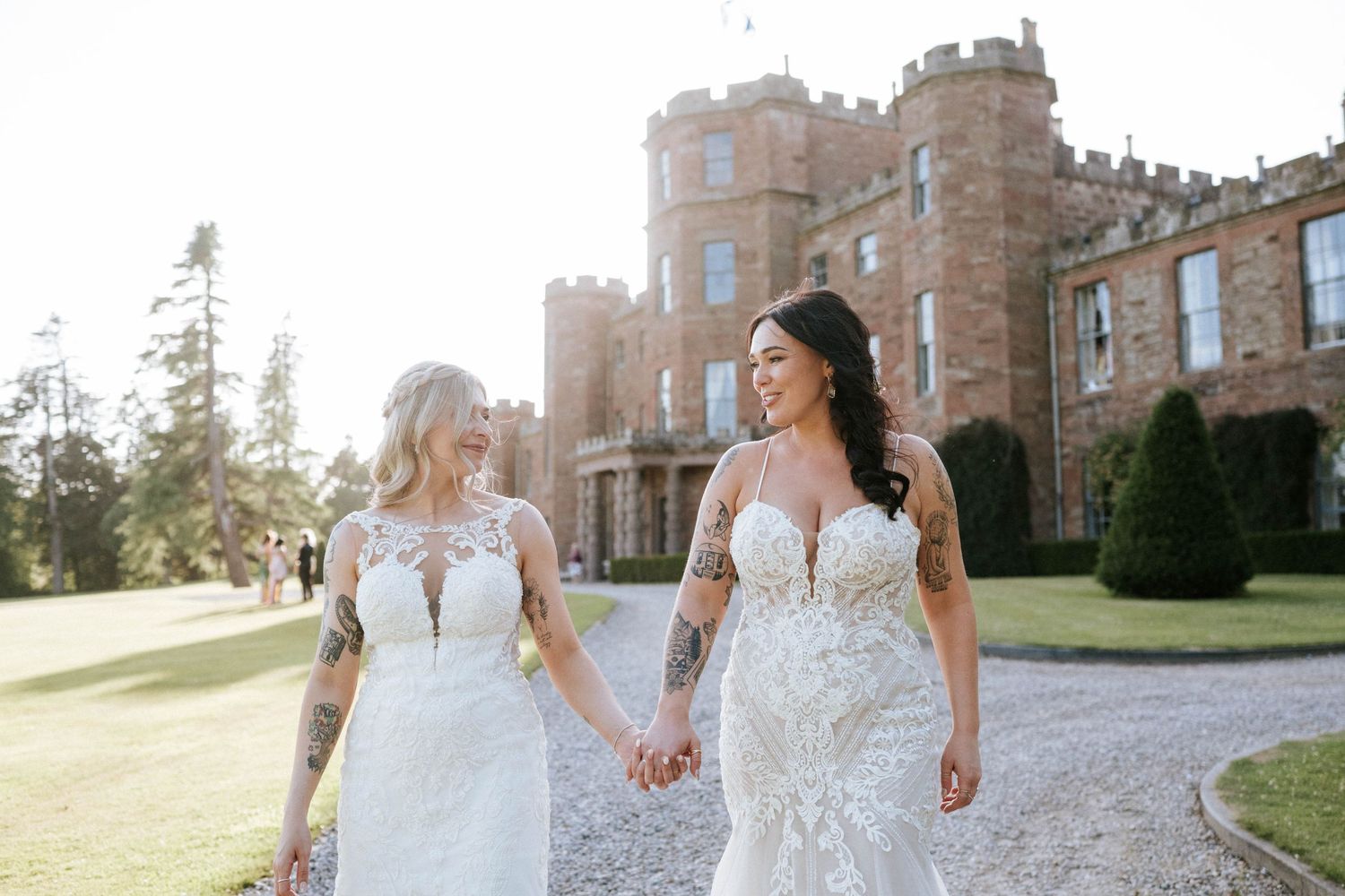 Fasque Castle Wedding Photography. Historic castle venue with stone architecture provides backdrop for wedding photographs.