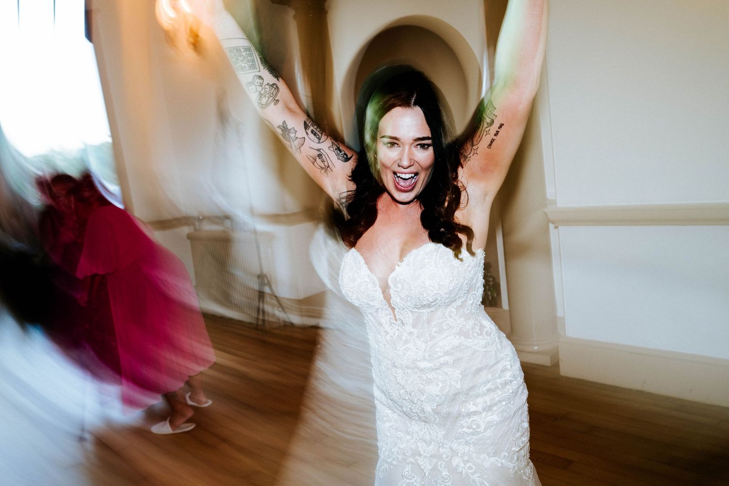 Aberdeen Wedding Photography. Blurred motion shots of dancing and celebration in an indoor venue.