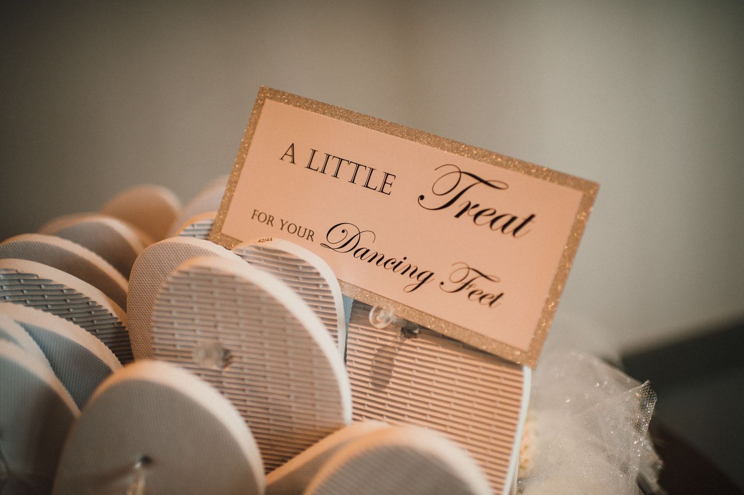 Wedding favor tag reading 'A Little Treat' with dancing tea theme.