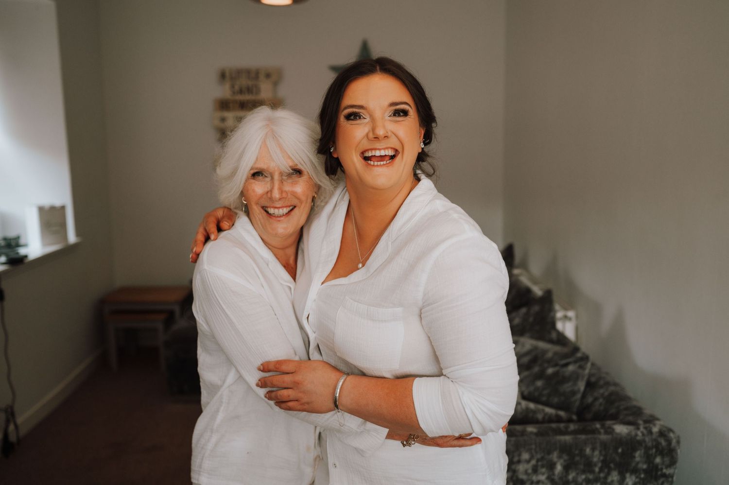 A heartwarming embrace captured in a room decorated with star wall art.